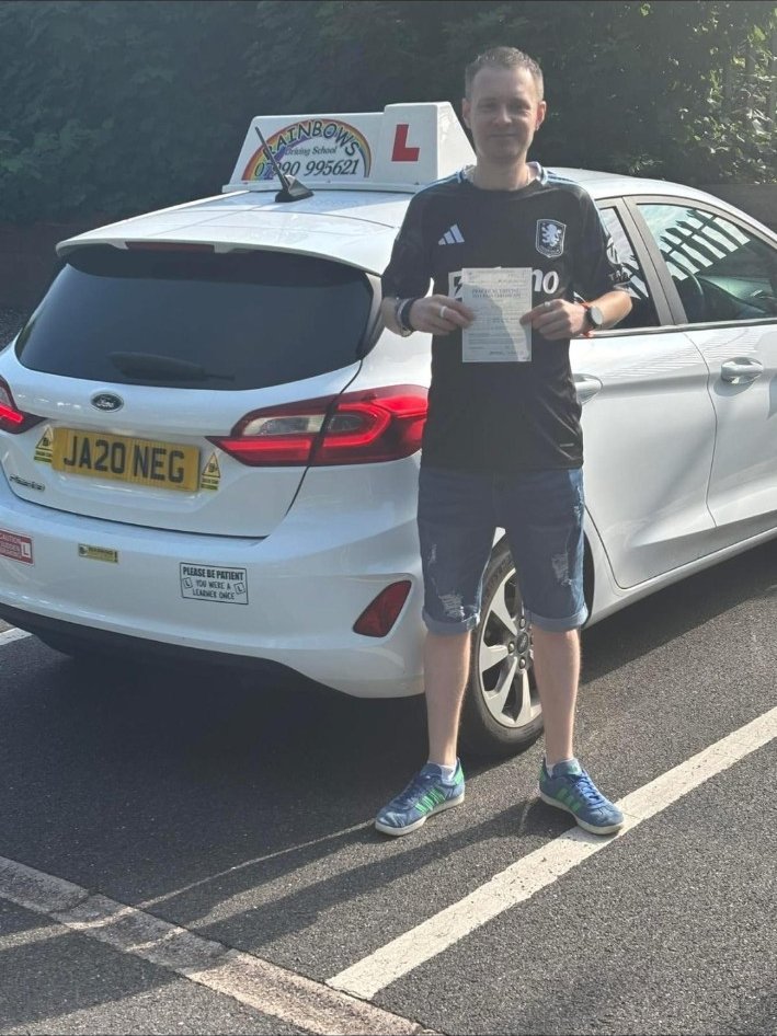 Rainbows pupil celebrating a driving achievement